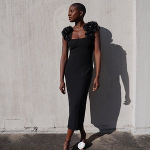 Black Organza floral appliques with pearl accents
Square neckline
Cutout back